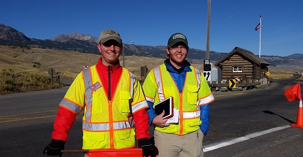 Student surveyors in safety vests 